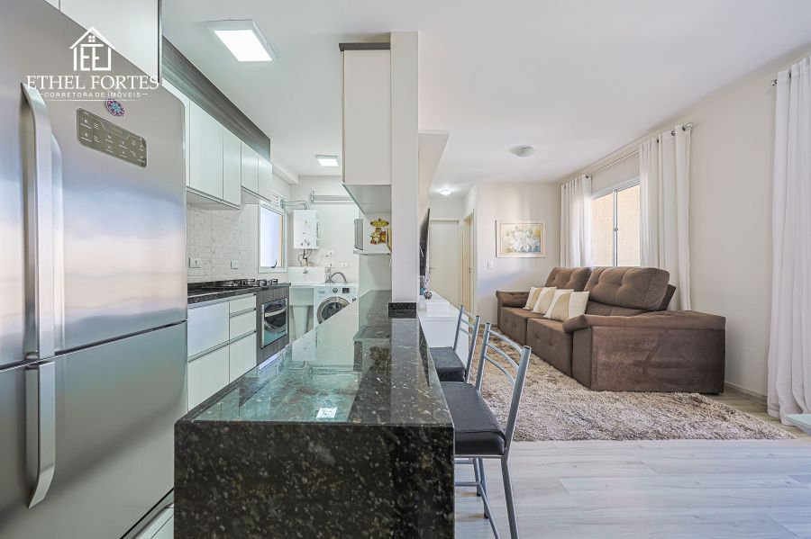 SALA DE ESTAR E JANTAR INTEGRADAS COM A COZINHA