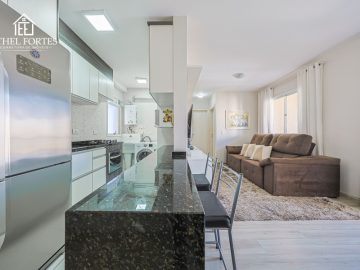 SALA DE ESTAR E JANTAR INTEGRADAS COM A COZINHA